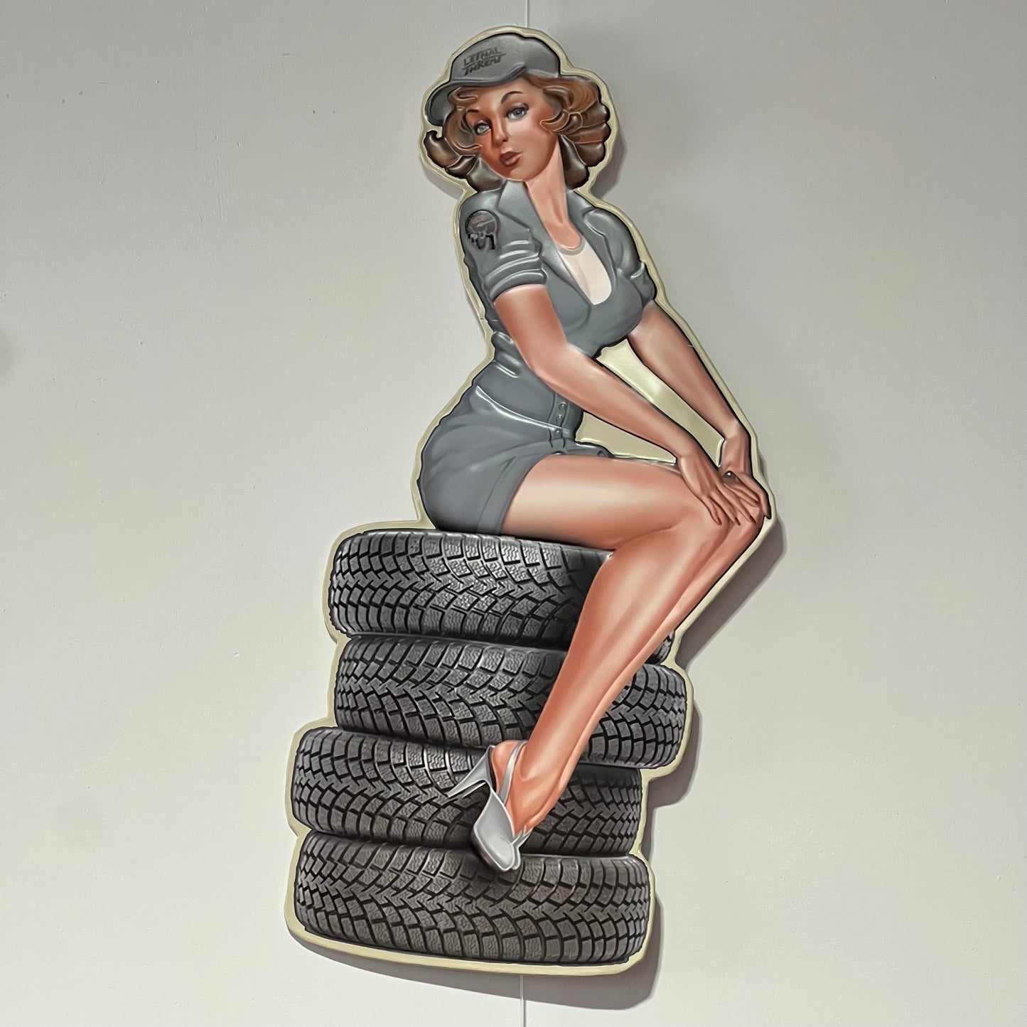 Pin-Up on Tires - Metal Wall Sign
